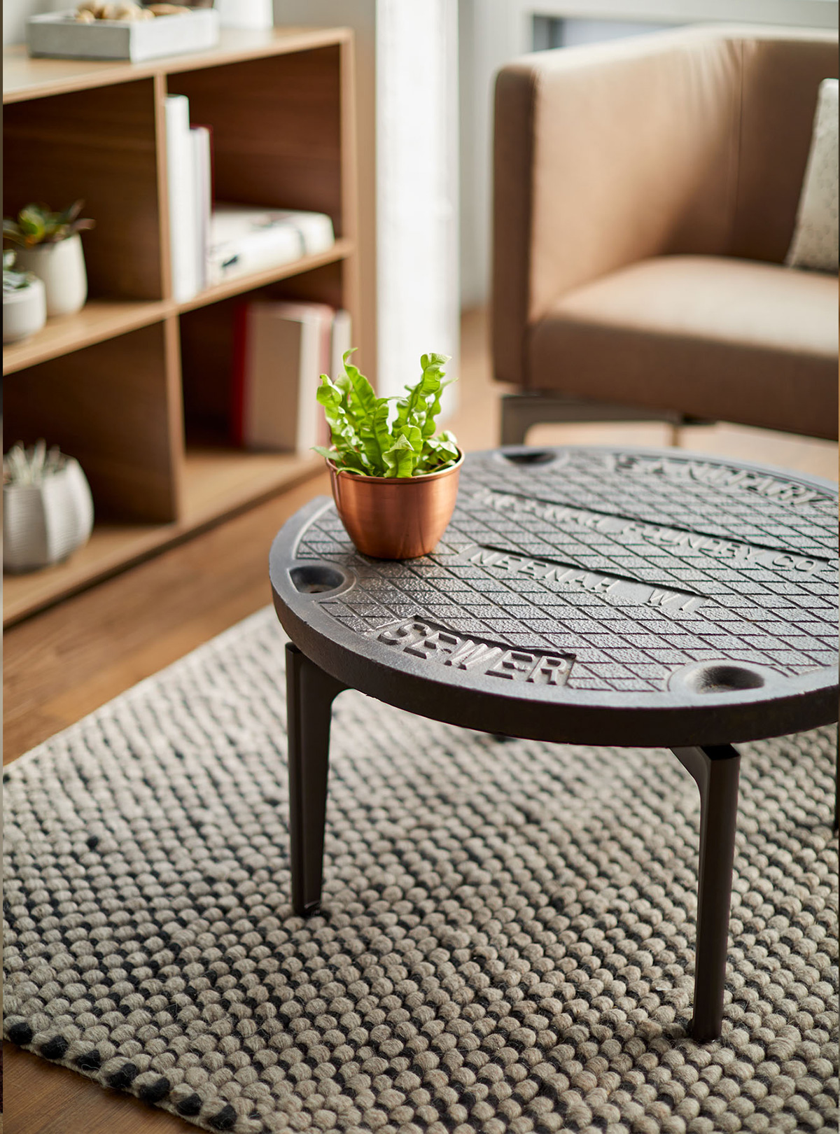 Bassline table with manhole top by turnstone