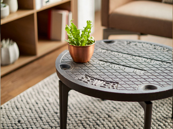 Bassline table with manhole top by turnstone