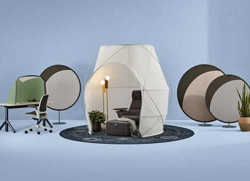 blue setting with boundary tents, white pod tent and table tent