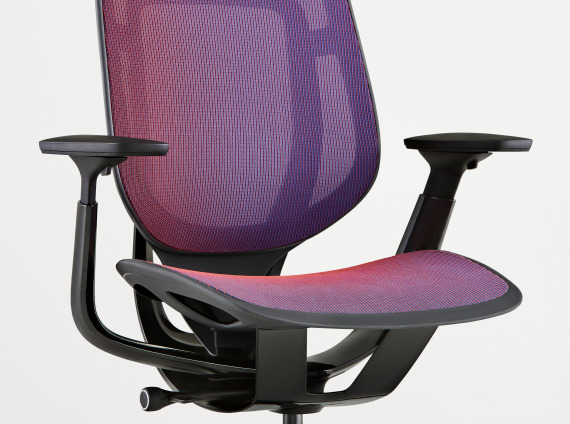 angled view of a Steelcase Karman chair with purple mesh