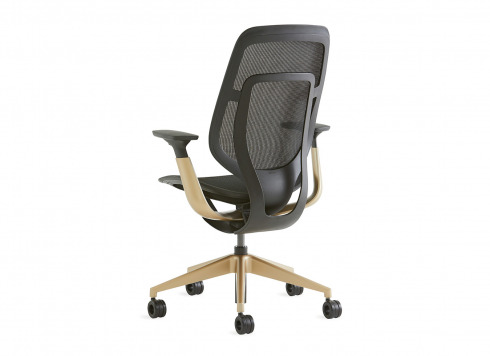 back view of a black karman chair with golden legs and arms
