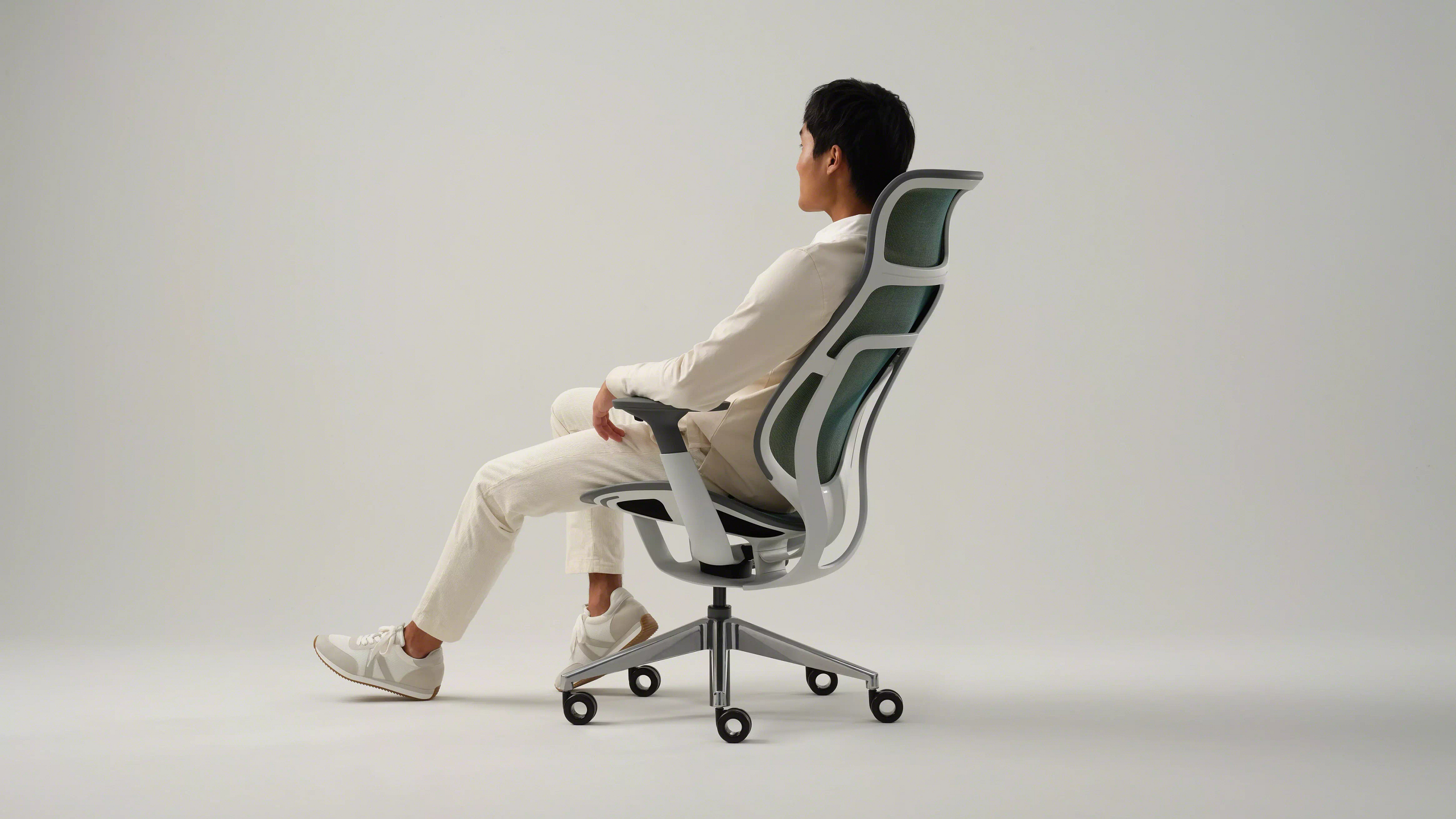 Man sitting in an ergonomic desk chair
